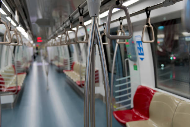 istock Subway in Singapore. View from the inside, the train compartment is empty. 972632508