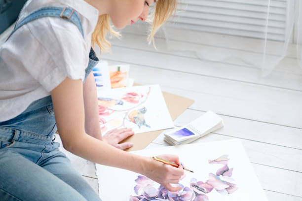 istock leisure art talent expression girl drawing picture 972640806