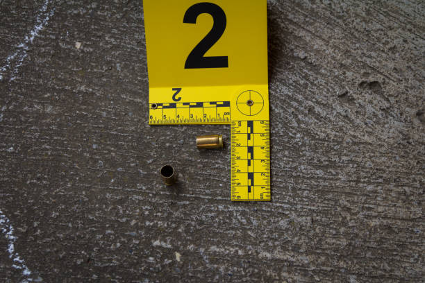Crime scene investigation Bullet shell marker on the ground shooting a weapon photos stock pictures, royalty-free photos & images