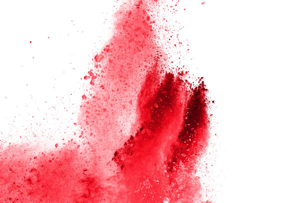 istock abstract red dust explosion on  white background. abstract red powder splattered on white background, Freeze motion of red powder splash. 972645186