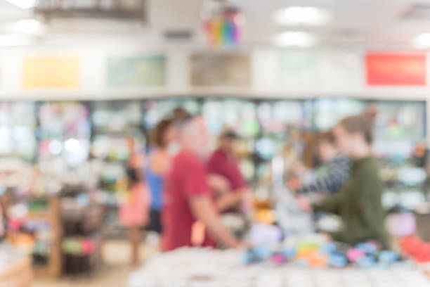 istock Abstract blurred busy people checkout counter in America 972650080