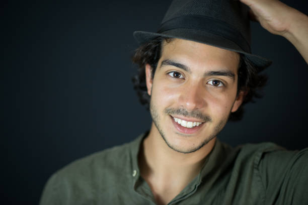 istock Close Up of Young Man With Hat 972650118