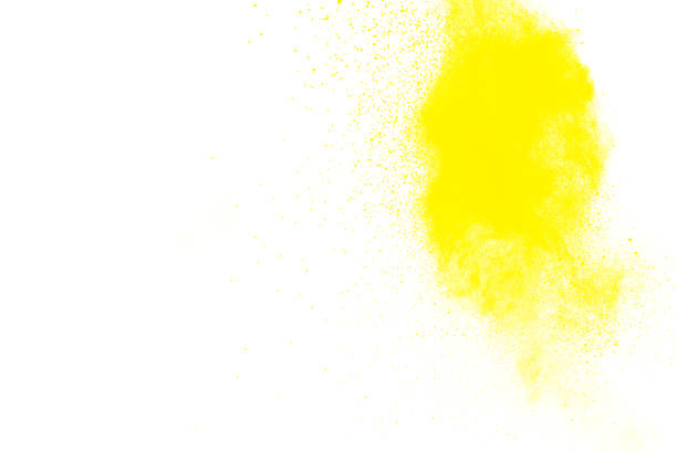 istock abstract yellow dust explosion on  white background. abstract yellow powder splatter on white background. Freeze motion of yellow powder splash. 972652330