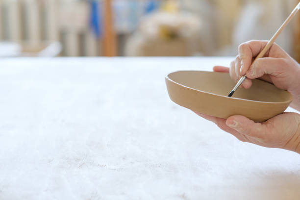 istock pottery handcraft hobby paint handmade clay plate 972656286
