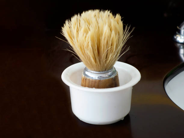 istock having brush - shaving men 972658936