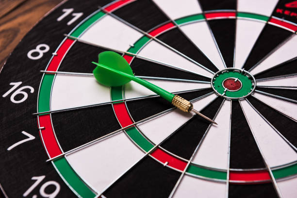 istock Green darts on the target 972659004