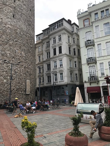 Istanbul,Turkey- May 28,2018:Galata District in Istanbul.People walking and shopping on the street.