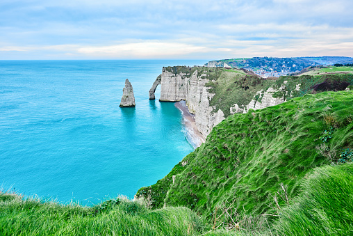 amazing landscape in France, Etretat region with blue sea side and mountains.