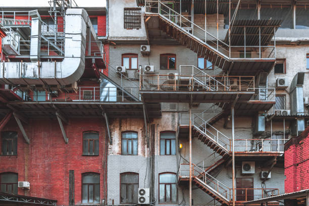 istock Old brick building facade in an industrial zone 972665118