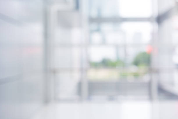 istock Blurred abstract wall building with big window glass background.material decoration design 972665312