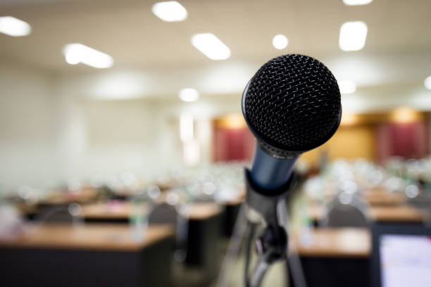 istock Microphone in meeting room 972672270