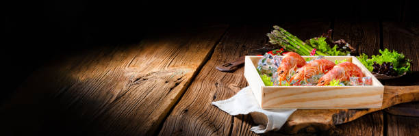 istock cooked argentine red prawns with salad on the ice 972675122