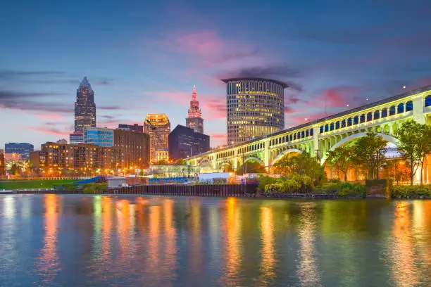 Cleveland, Ohio, USA downtown city skyline on the Cuyahoga River at twilight.