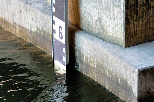 Detail view of a level for water level measurement at the Alster in Hamburg