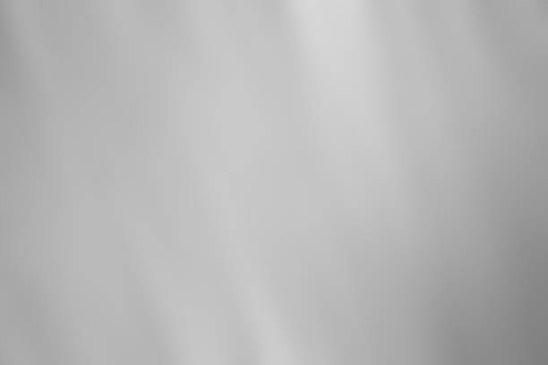 istock white blur abstract background. bokeh christmas blurred beautiful shiny Christmas lights 972687566