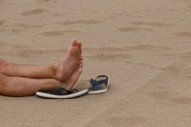 istock man enjoys the beach 972693986