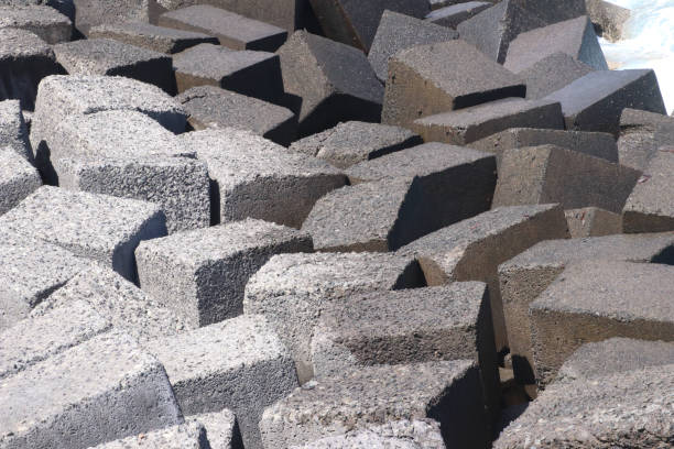 istock blocks of stone in a coast front-line 972694074