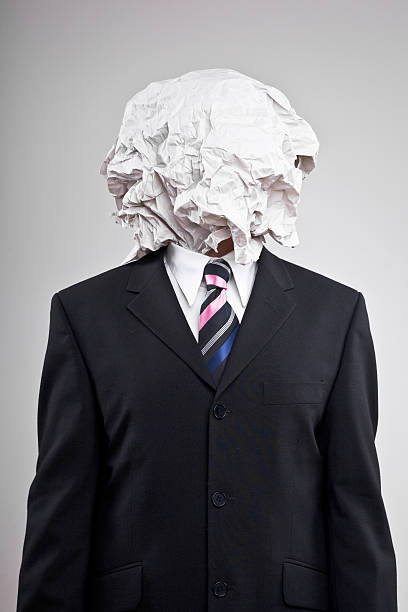 istock Man in a suit with paper on his head 97269724