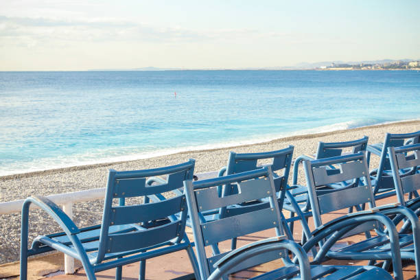 istock Blue chairs in Nice, France 972699952