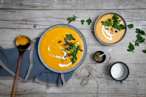 istock Directly Above Shot Of Pumpkin Soup On Table 972701402