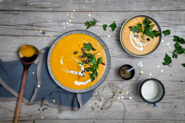 istock Directly Above Shot Of Pumpkin Soup On Table 972701460