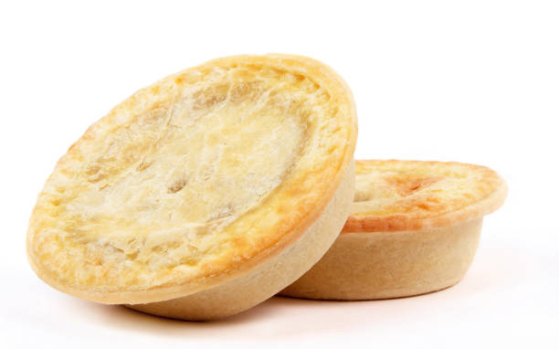Close-Up Of Pie Against White Background  meat pie stock pictures, royalty-free photos & images