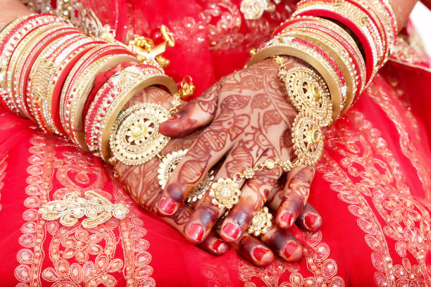 istock Close up of Decorative hands of Indian Bride 972709838