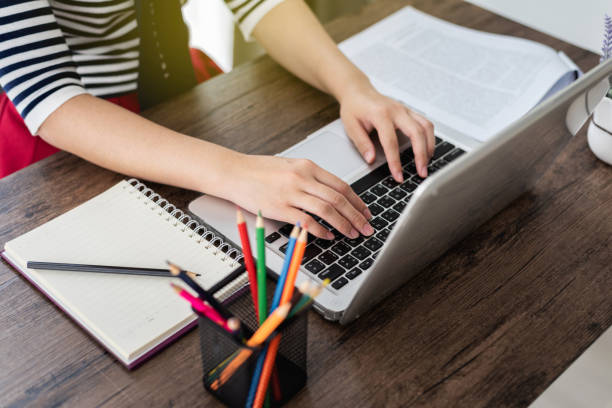 istock Business woman hands typing on laptop keyboard in office 972717610