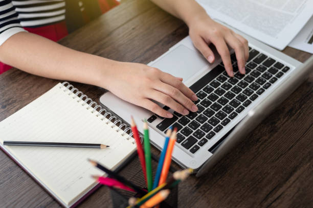 istock Business woman hands typing on laptop keyboard in office 972717648