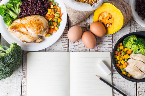 istock Dieting plan Healthy food and clean eating ingredients concept top view copy space 972718410