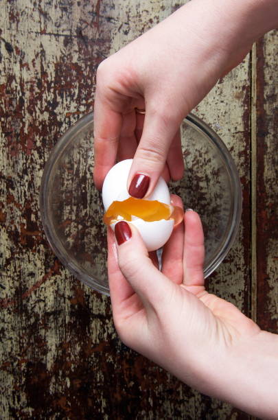 istock Close-Up Of Hand Holding Bowl Of Table 972722192
