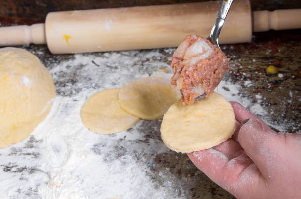 istock Close-Up Of Person Preparing Food 972722746