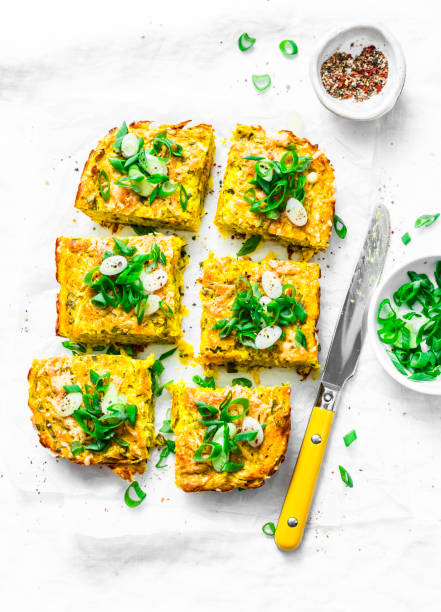 istock Turmeric, zucchini, mashed chickpeas tortilla with herbs on a light background, top view. Delicious appetizers or snack 972739382