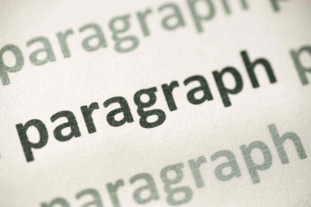 párrafo de la palabra impresa en macro de papel - paragraphs fotografías e imágenes de stock