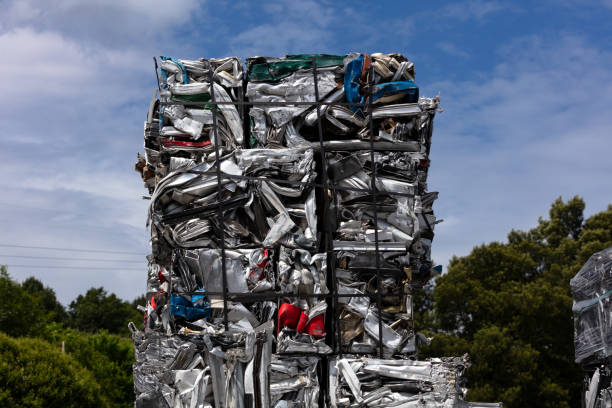 aluminum scrap in cubes for remelting aluminum profiles and scrap pressed into cubes for remelting in a foundry utilize stock pictures, royalty-free photos & images