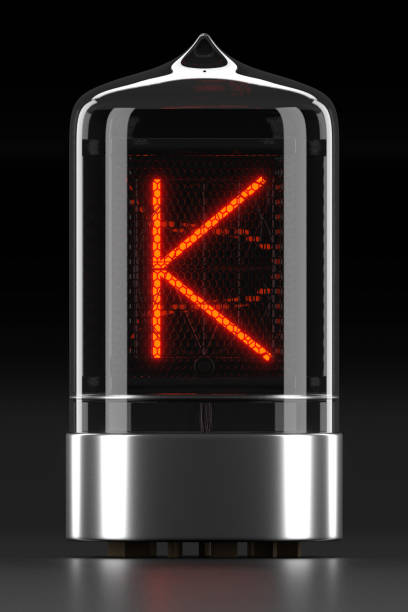 nixie tubo indicador, lámpara de descarga de gas en fondo oscuro. letra "k" de retro. render 3d - letter k audio fotografías e imágenes de stock