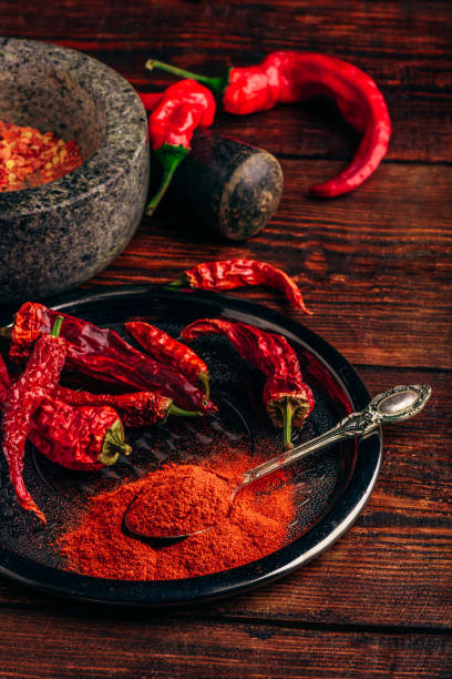 istock Ground and dried red chili peppers 972746692
