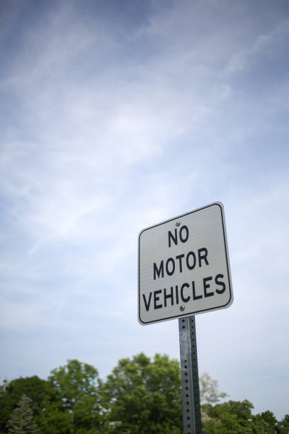 istock Isolated No Motor Vehicles Street Sign 972755168