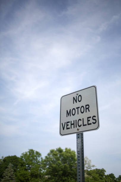istock Isolated No Motor Vehicles Street Sign 972755192