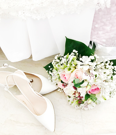 Wedding shoes and wedding bouquet