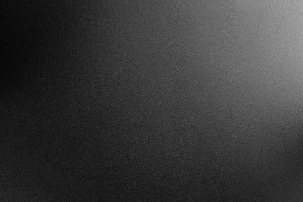 istock black paper texture or background with spotlight, dark tone 972763908
