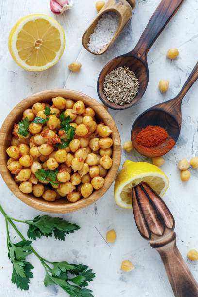 istock Spicy appetizer of boiled chickpeas. 972774834
