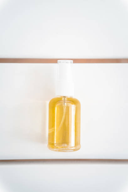 istock Spa face, hair, body oil bottle from above 972775250