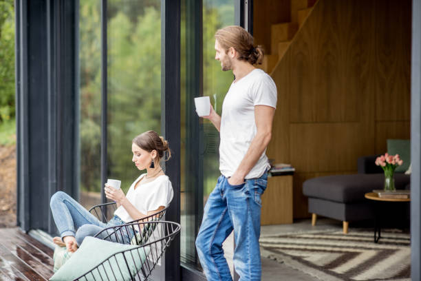 istock Couple on the terrace of the modern house 972778312