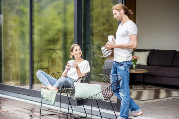 istock Couple on the terrace of the modern house 972778332