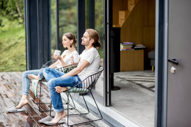 istock Couple on the terrace of the modern house 972778538