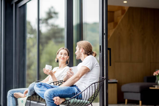 istock Couple on the terrace of the modern house 972778566