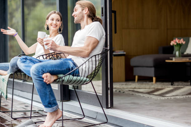 istock Couple on the terrace of the modern house 972778604