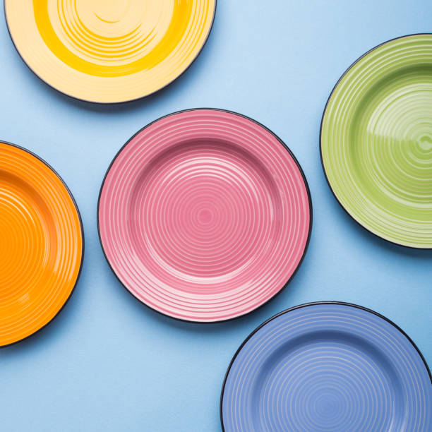 istock Colorful ceramic dishes. Flat lay 972785664