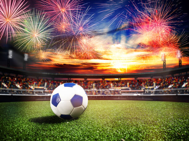 Fireworks over soccer stadium as final win game Fireworks over soccer football stadium as world cub championship final game win concept background, mixed media tribune tower stock pictures, royalty-free photos & images
